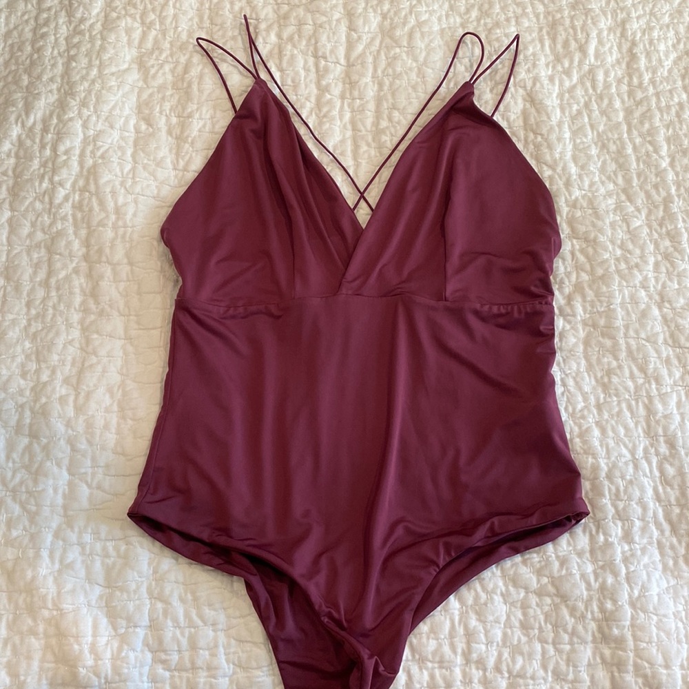 Wine colored strappy bodysuit